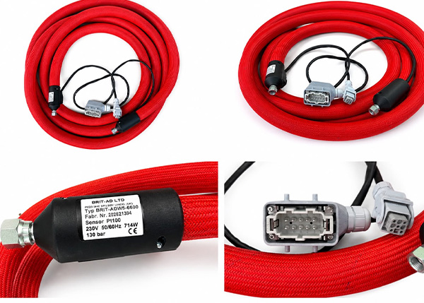 Red heated adhesive hoses with connectors and temperature sensor, suitable for industrial applications.