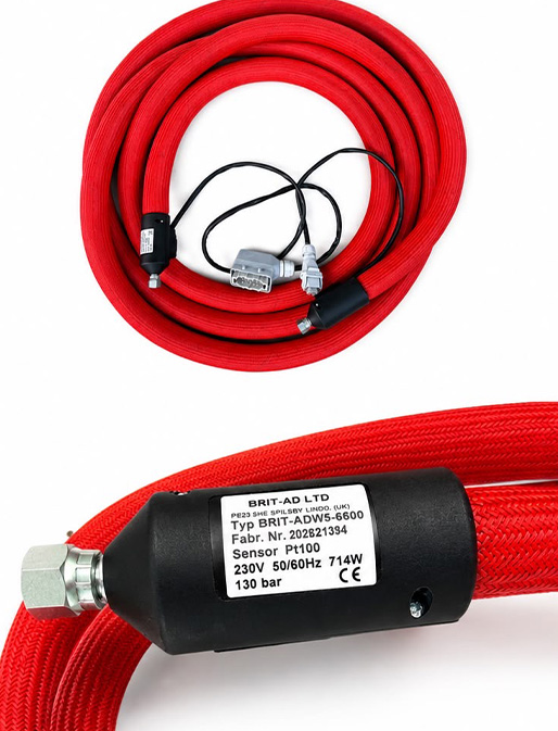 Red heated hose assembly with sensor attachment and technical label.
